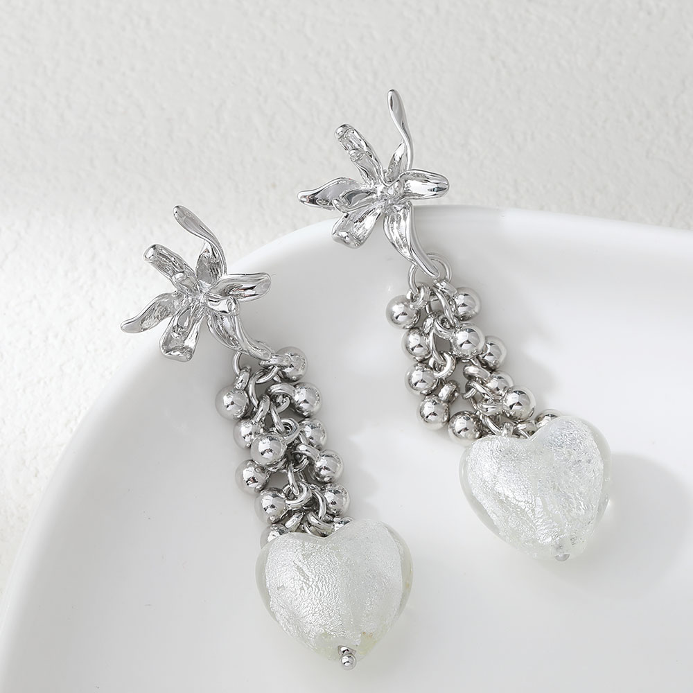 Clous d'oreilles en forme de f - Flower Supplies avis et prix